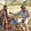 Eliupendo Laltaika interviewing a member of the Sonjo community.