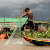 A young fisherman uses a legal net.