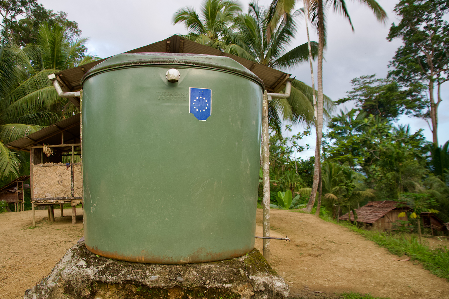 A rainwater tank in Wuguble, a village that sits inside tree kangaroo habitat in the Torricellis.