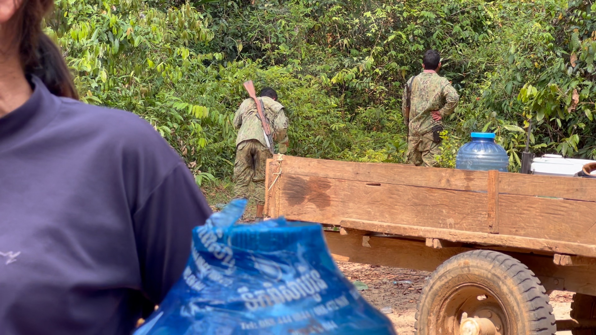 Armed rangers working for the Ministry of Environment pursued the community through Chhaeb-Preah Roka Wildlife Sanctuary in April 2023. Image by Chasing Deforestation / Mongabay.