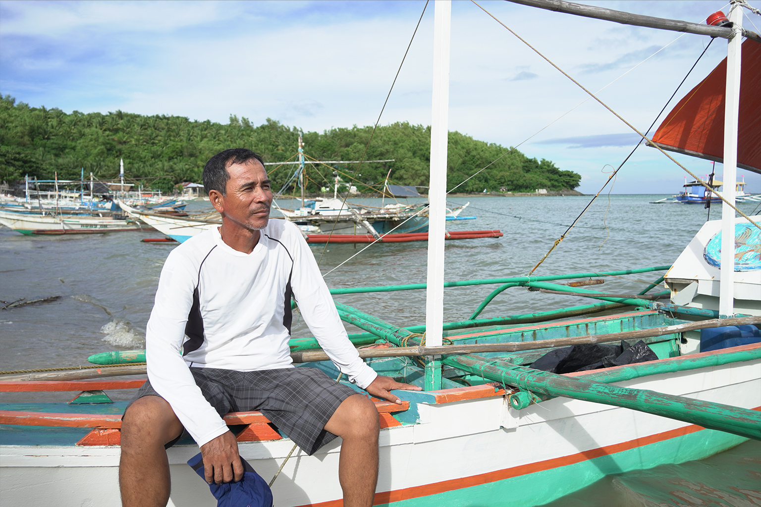 Fisherfolk leader Lorene Gabayeron gazes upon the mangrove planting site