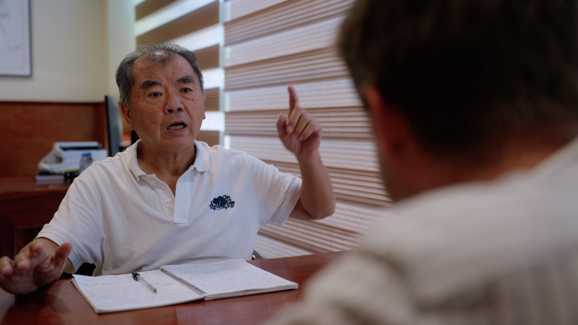 Lu Chu Chang, director of Think Biotech, vehemently denied involvement in illegally felling trees in Prey Lang Wildlife Sanctuary during his interview with Mongabay in June 2023. Image by Chasing Deforestation / Mongabay.
