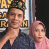 Syarak, the customary elder in Bumi Harapan, with his wife.